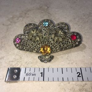 Vintage brooch EUC gold tone filigree with colored stones